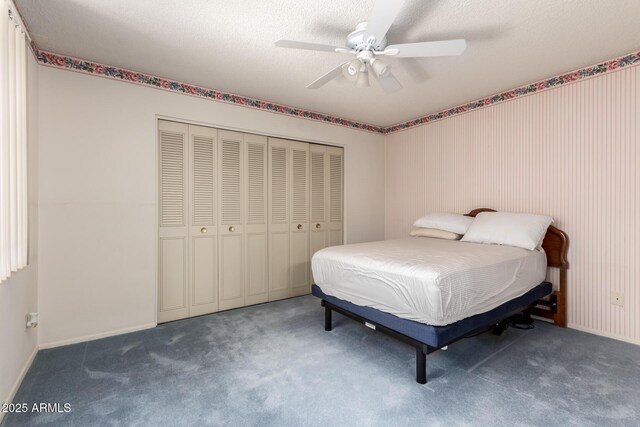 2442 N 22nd Ave, Phoenix, AZ 85009 - bedroom featuring carpet flooring, baseboards, a closet, and ceiling fan