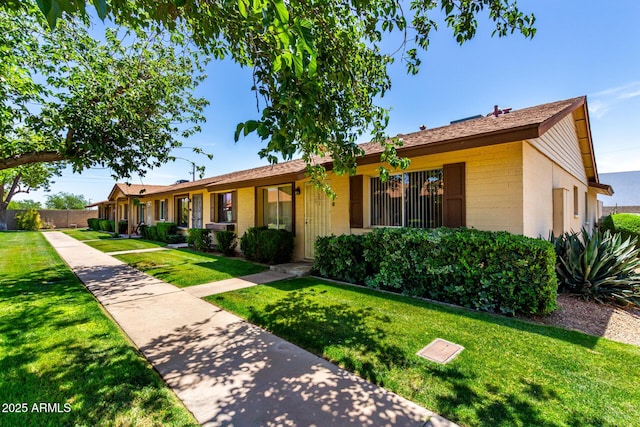 2442 N 22nd Ave, Phoenix, AZ 85009 - ranch-style house featuring concrete block siding