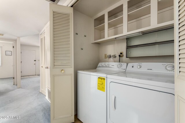 2442 N 22nd Ave, Phoenix, AZ 85009 - washroom with independent washer and dryer and light colored carpet
