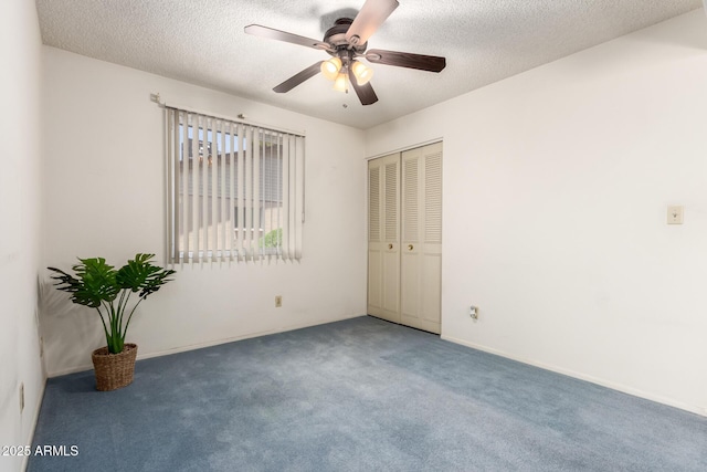 2442 N 22nd Ave, Phoenix, AZ 85009 - spare room featuring carpet, a ceiling fan, a textured ceiling, and baseboards
