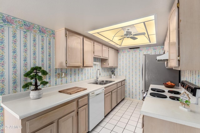 2442 N 22nd Ave, Phoenix, AZ 85009 - kitchen with white appliances, a sink, ceiling fan, light tile patterned flooring, and light countertops
