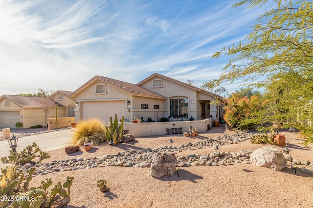 view of front of property with a garage