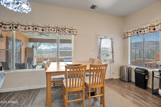 44421 N 12th St, New River, AZ 85087 - dining area with wood finished floors and baseboards