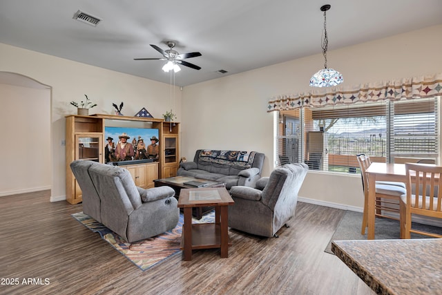 44421 N 12th St, New River, AZ 85087 - living room with wood finished floors, baseboards, and a ceiling fan