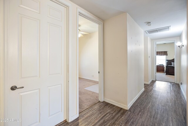 44421 N 12th St, New River, AZ 85087 - corridor featuring dark wood-type flooring and baseboards