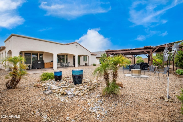 back of property with a patio area