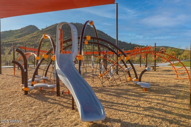 community playground with a mountain view