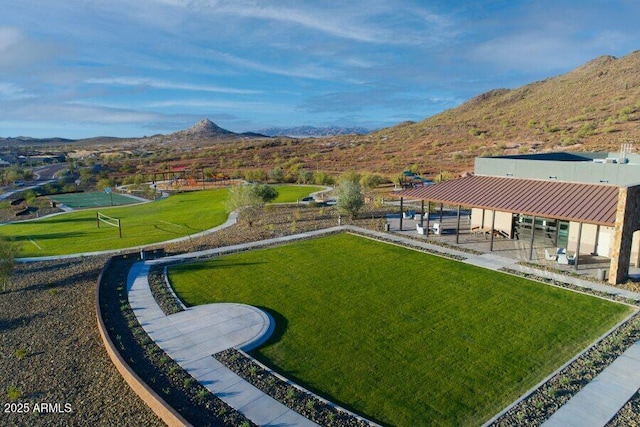 view of yard with a patio area and a mountain view