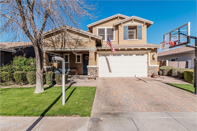 view of front of house with a garage and a front yard