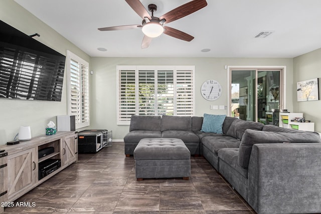 living room with ceiling fan