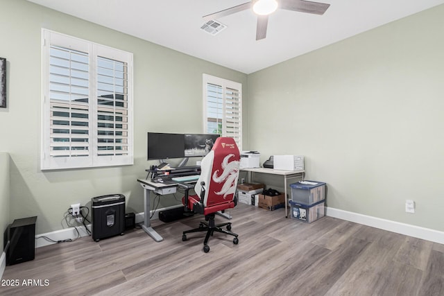 office area featuring ceiling fan and light hardwood / wood-style flooring