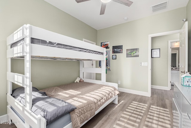 bedroom featuring wood-type flooring and ceiling fan