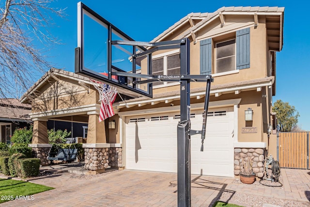 view of front of property featuring a garage