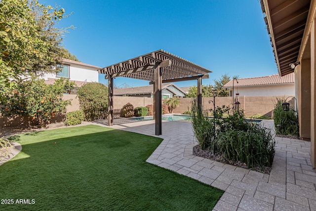 view of yard featuring a fenced in pool, a patio area, and a pergola