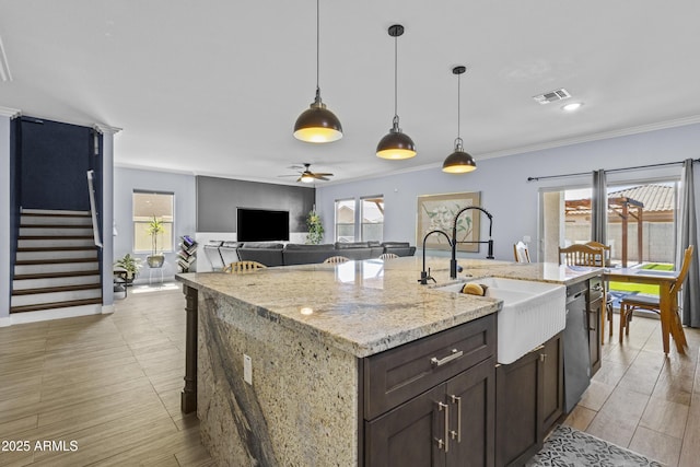 19239 W Elm St, Litchfield Park, AZ 85340 - kitchen featuring healthy amount of natural light, ceiling fan, decorative light fixtures, dishwasher, and crown molding