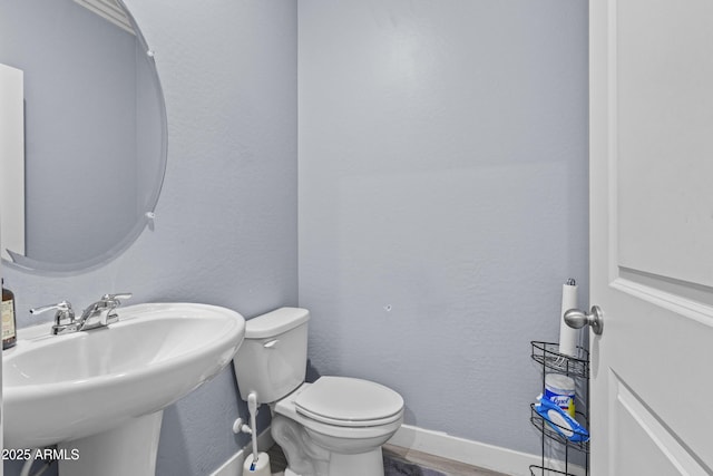 19239 W Elm St, Litchfield Park, AZ 85340 - half bathroom with toilet and a sink