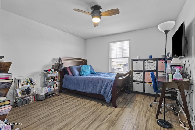 19239 W Elm St, Litchfield Park, AZ 85340 - bedroom with wood finished floors and a ceiling fan
