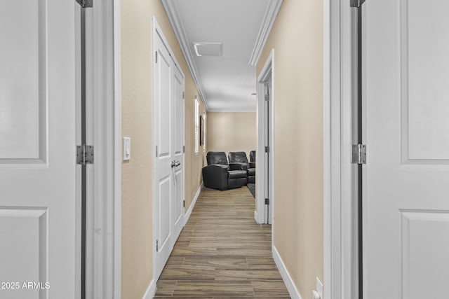 19239 W Elm St, Litchfield Park, AZ 85340 - corridor with wood finished floors and ornamental molding