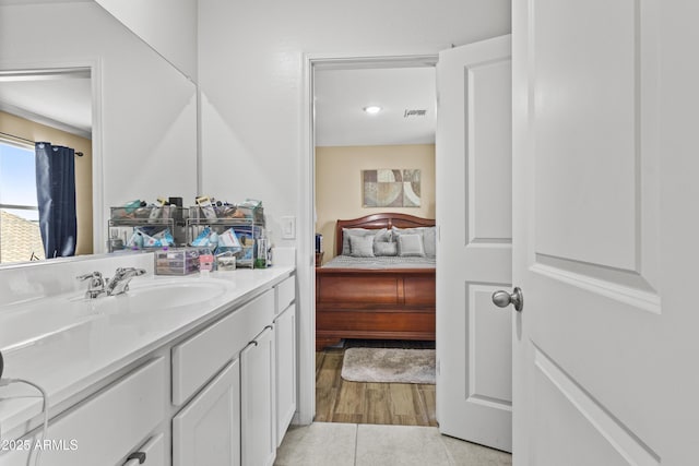 19239 W Elm St, Litchfield Park, AZ 85340 - ensuite bathroom featuring vanity