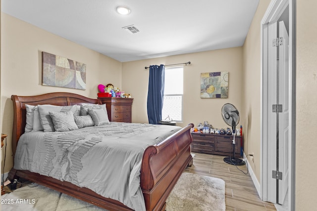 19239 W Elm St, Litchfield Park, AZ 85340 - bedroom featuring light wood-style floors and baseboards