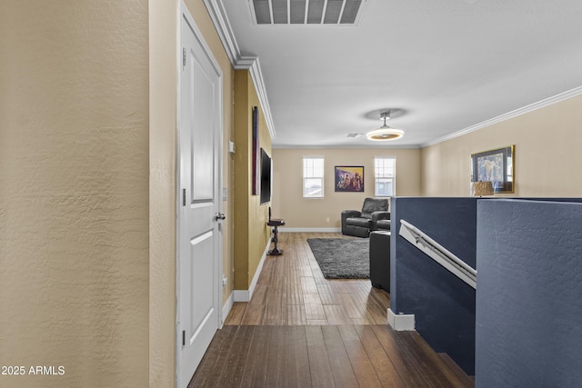 19239 W Elm St, Litchfield Park, AZ 85340 - hall featuring wood-type flooring, ornamental molding, and a textured wall
