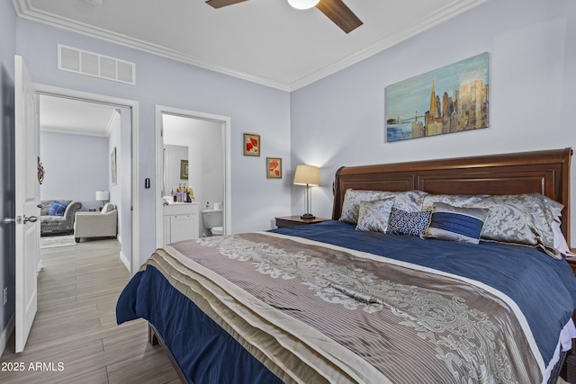 19239 W Elm St, Litchfield Park, AZ 85340 - bedroom featuring crown molding, wood finished floors, connected bathroom, and a ceiling fan