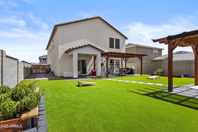 19239 W Elm St, Litchfield Park, AZ 85340 - back of house with a pergola, a fenced backyard, stucco siding, a patio, and a tile roof
