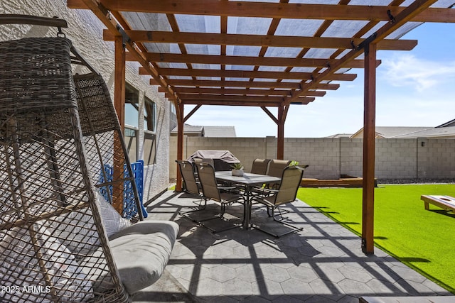 19239 W Elm St, Litchfield Park, AZ 85340 - fenced backyard featuring a pergola, outdoor dining area, and a patio area