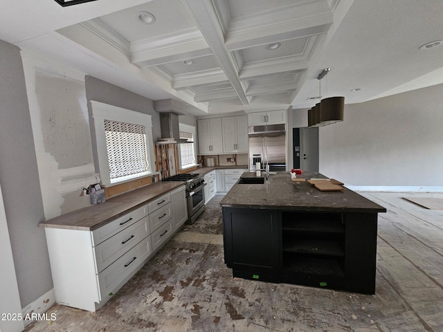 kitchen with wall chimney exhaust hood, coffered ceiling, white cabinetry, high quality appliances, and a kitchen island