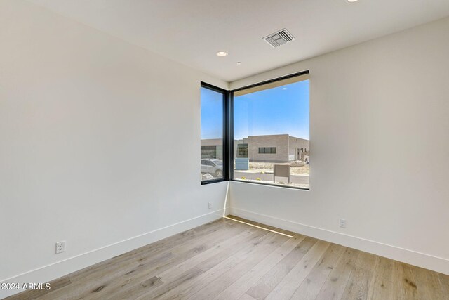 empty room featuring light hardwood / wood-style floors