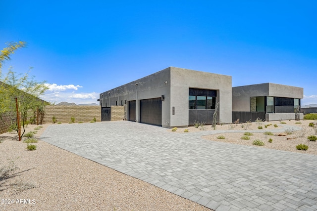 view of front of home with a garage