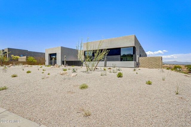 view of adobe home