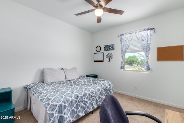 bedroom with ceiling fan and carpet flooring