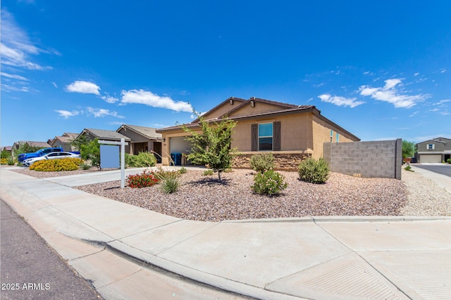 single story home featuring a garage