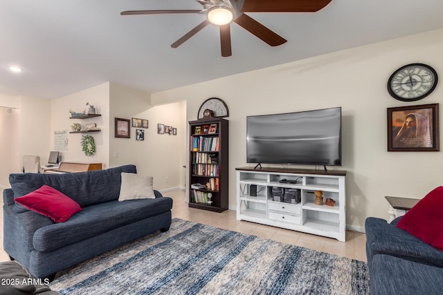 tiled living room with ceiling fan