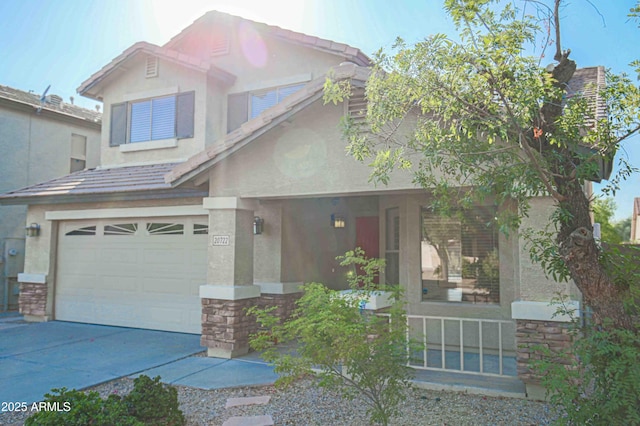 20722 N 38th St, Phoenix, AZ 85050 - view of front facade featuring a garage, stone siding, stucco siding, and concrete driveway