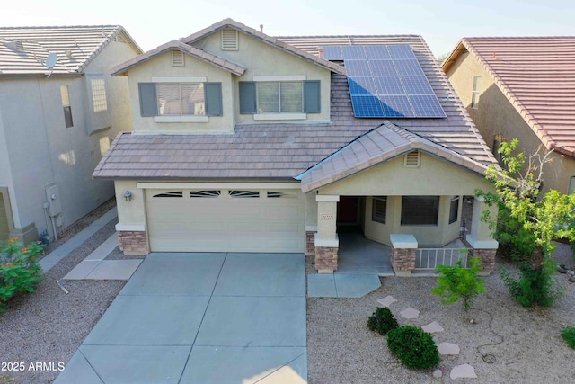 20722 N 38th St, Phoenix, AZ 85050 - view of front of house featuring stucco siding, roof mounted solar panels, concrete driveway, stone siding, and an attached garage