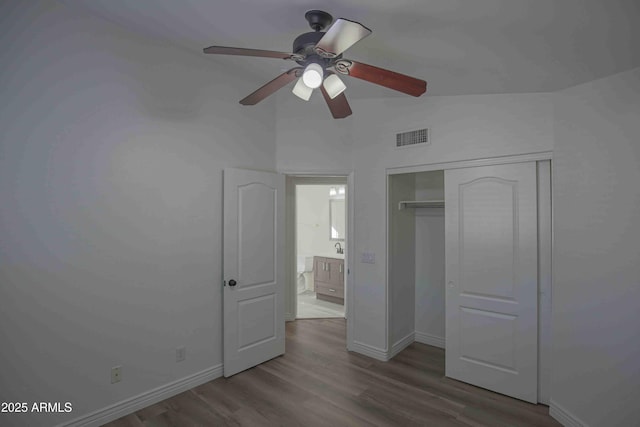 20722 N 38th St, Phoenix, AZ 85050 - unfurnished bedroom featuring wood finished floors, a closet, and ceiling fan