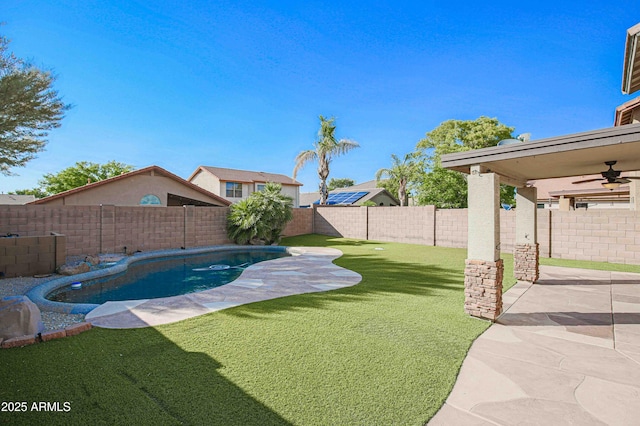 20722 N 38th St, Phoenix, AZ 85050 - fenced backyard with a patio area and a ceiling fan
