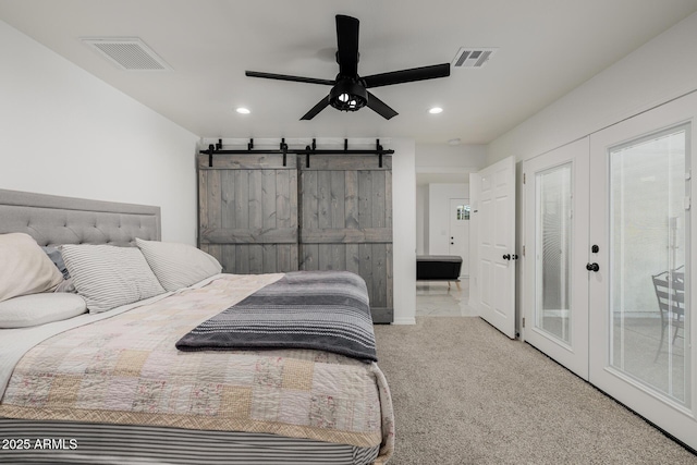 2350 E Melrose St, Gilbert, AZ 85297 - carpeted bedroom with recessed lighting, french doors, a barn door, and a ceiling fan