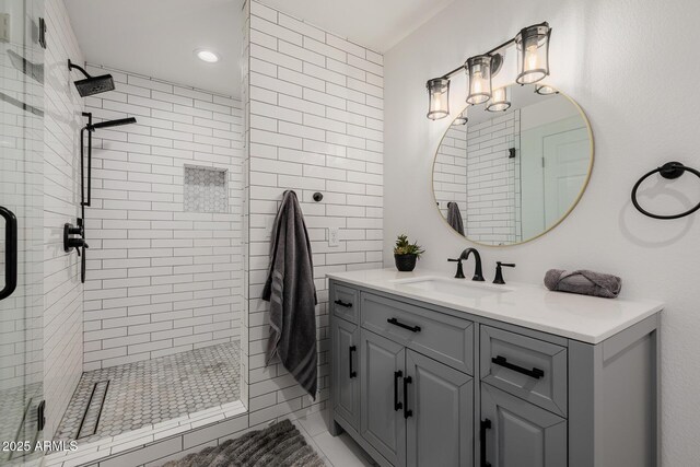 2350 E Melrose St, Gilbert, AZ 85297 - bathroom featuring a tile shower, vanity, and recessed lighting