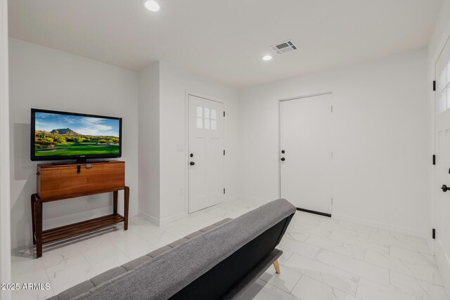 2350 E Melrose St, Gilbert, AZ 85297 - foyer entrance featuring light marble finish floors, recessed lighting, and baseboards