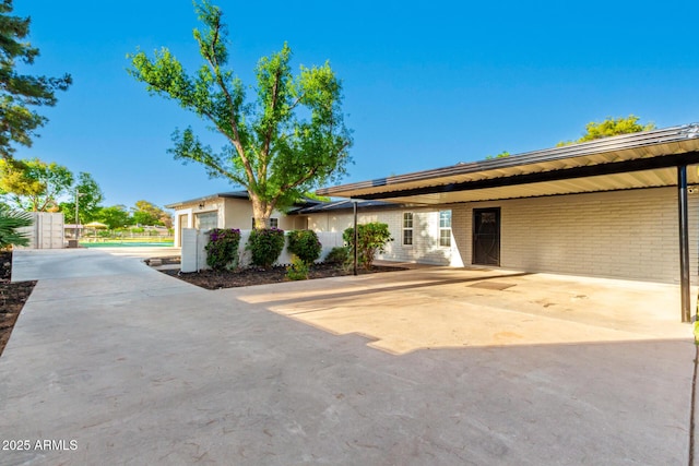 2350 E Melrose St, Gilbert, AZ 85297 - ranch-style house featuring brick siding and a gate