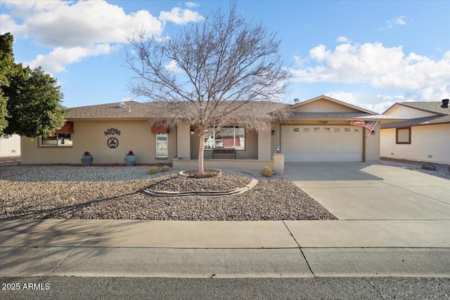 single story home featuring a garage