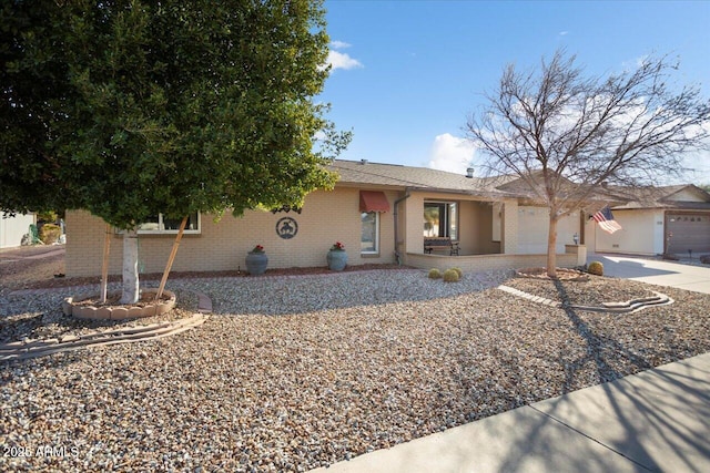 single story home with a garage