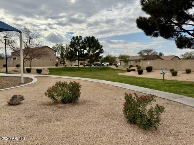 view of community featuring a lawn