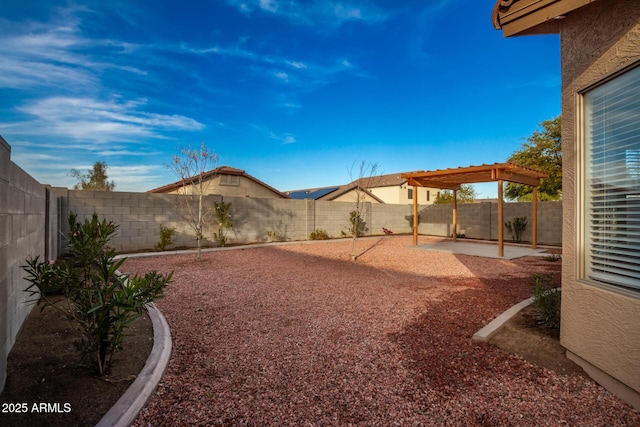 view of yard featuring a patio and a pergola