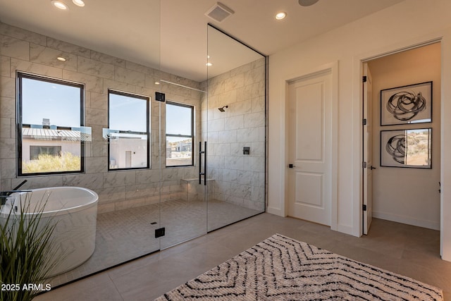 bathroom with tile walls, plus walk in shower, and tile patterned floors