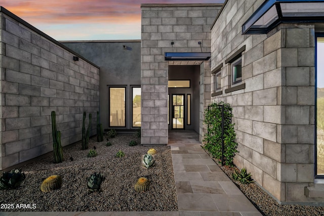24911 N 124th Way, Scottsdale, AZ 85255 - exterior entry at dusk with stucco siding