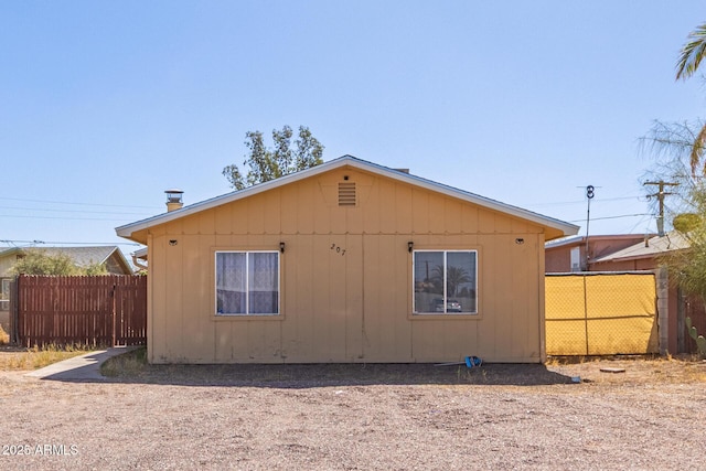 view of property exterior with fence